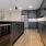 Townhome Kitchen with wine refrigerator in island