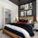 Large well lit bedroom with plush carpets and spacious closet