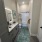 A8 Bathroom with tiled shower & backlit mirror